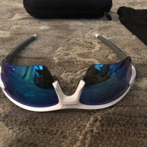 Oakley Sunglasses. Comes with original dust bag, and case.